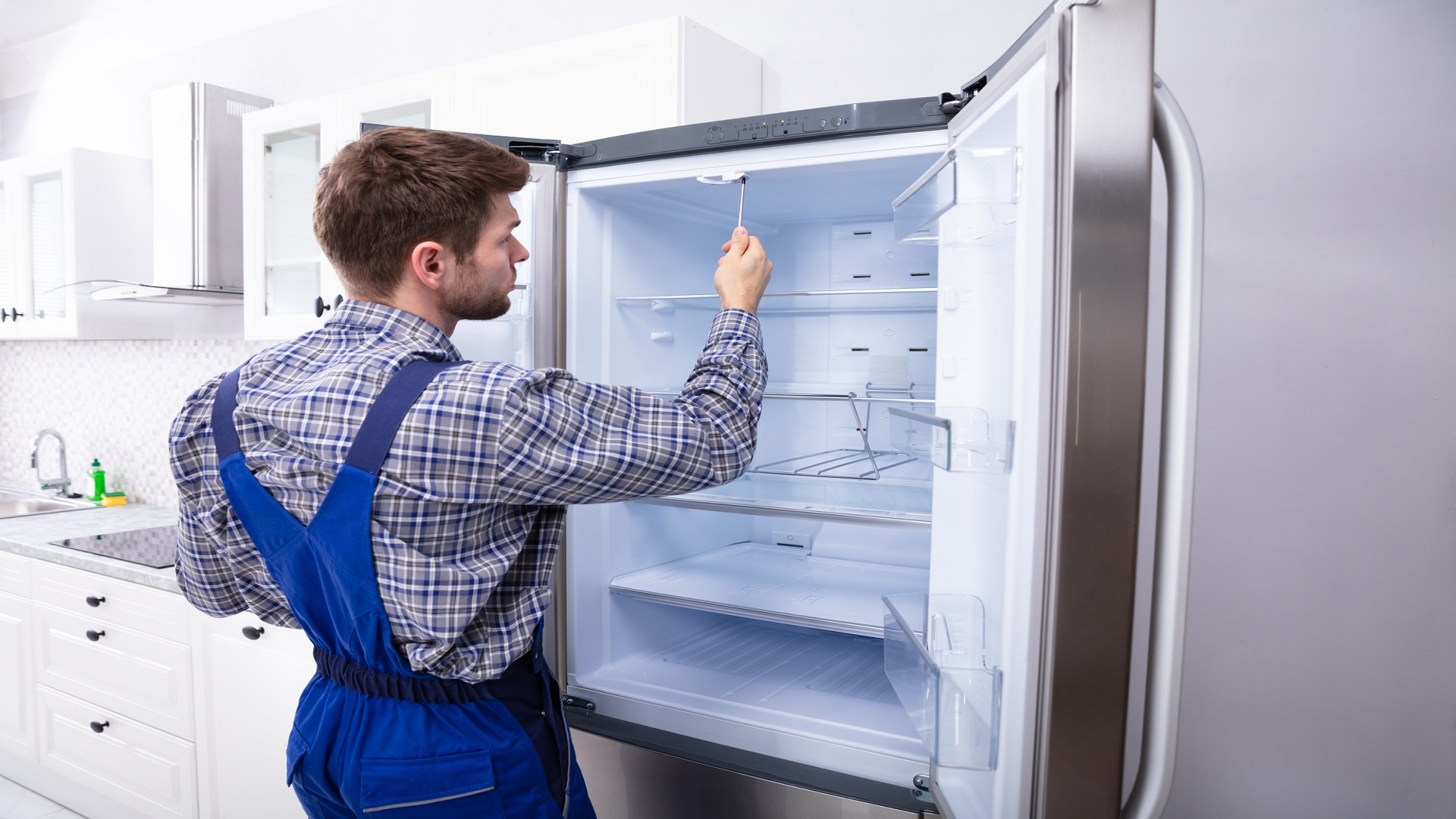 Commercial refrigeration repair service in Seattle, WA, with technicians working on refrigeration systems, ensuring optimal functionality for local businesses.